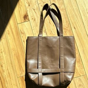 Soft brown large zippered tote, one inside pocket